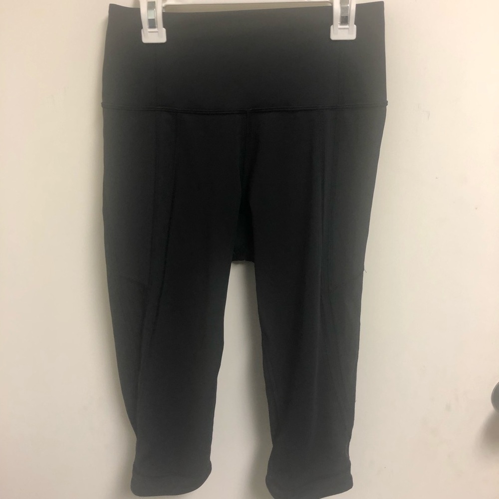 Black lululemon crop leggings with mesh inserts